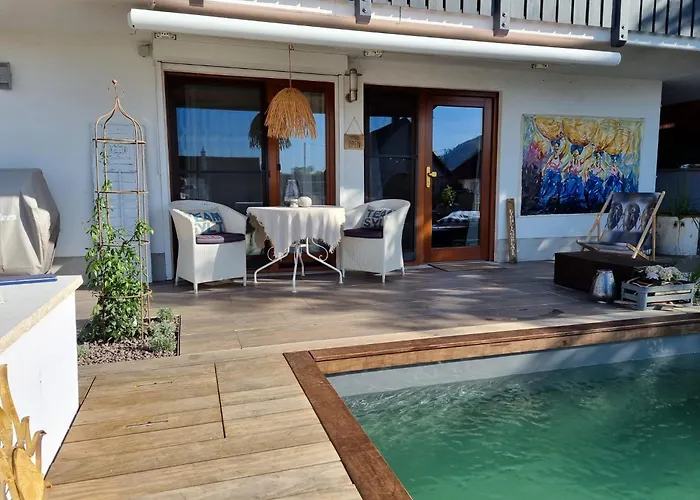 Апартаменты 22, Terrasse,pool,sauna,ofen Neuffen